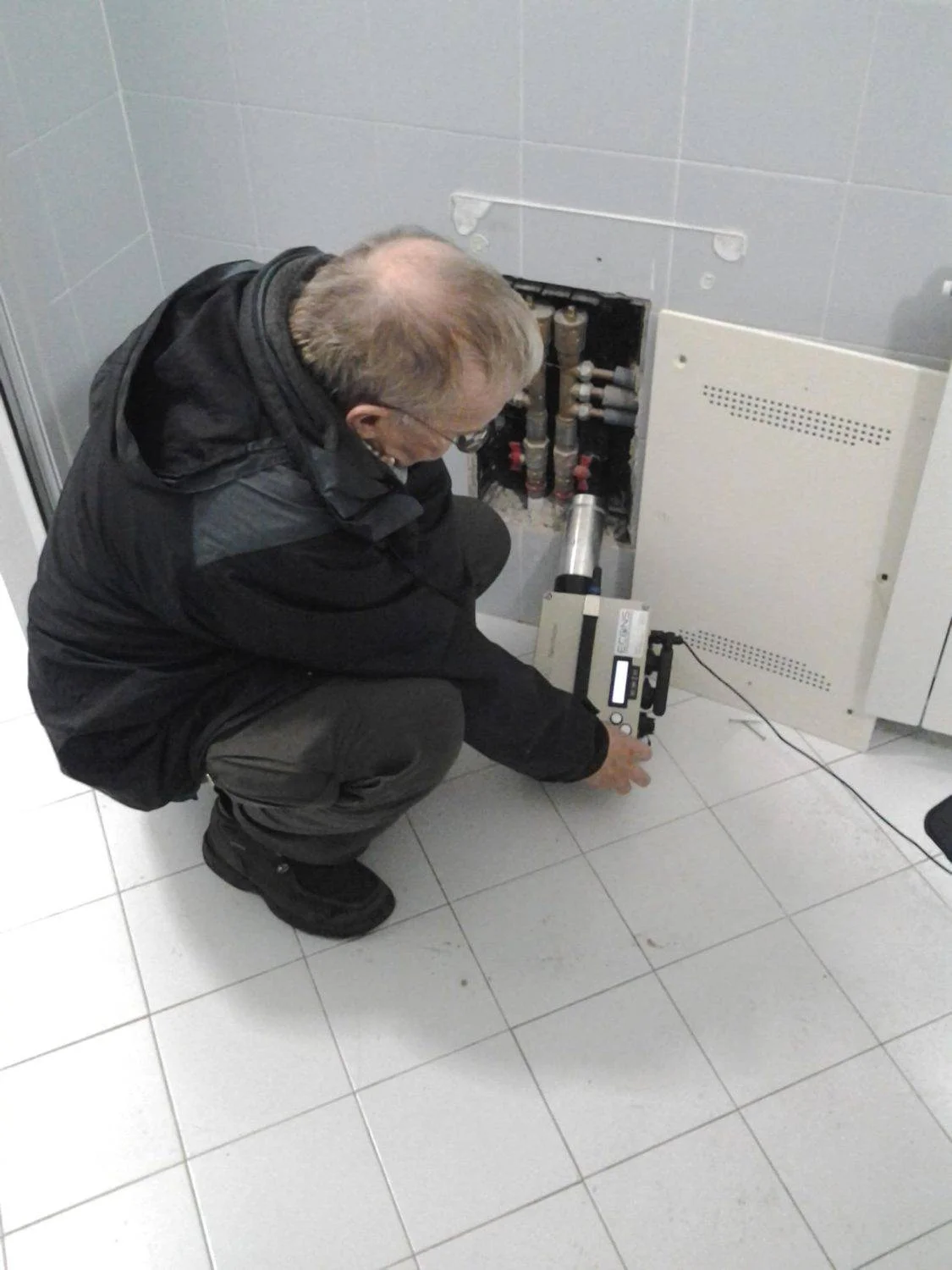 Technicians during radon survey at construction site